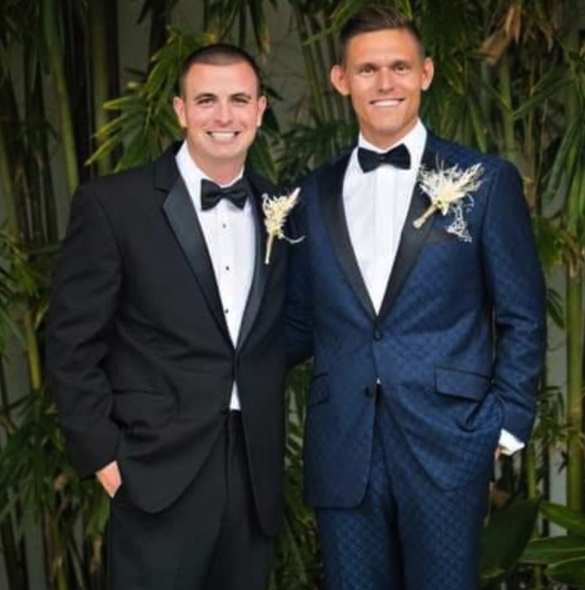 A wedding party in custom suits